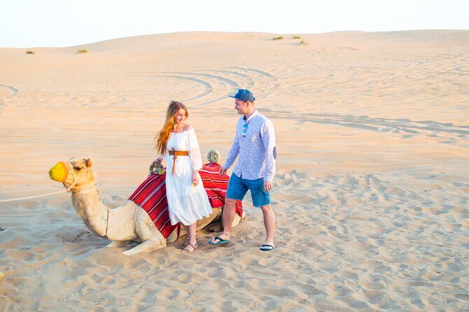 Evening Desert Safari with Quad Bike, BBQ Dinner and Camel Ride - Into Lahbab: dune bashing, tire deflation, and sunset photos