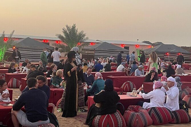 Evening Desert Safari with Quad Bike, Camel Ride & BBQ Dinner - Camp Comfort: Water, Shisha, and the Sunset Moment