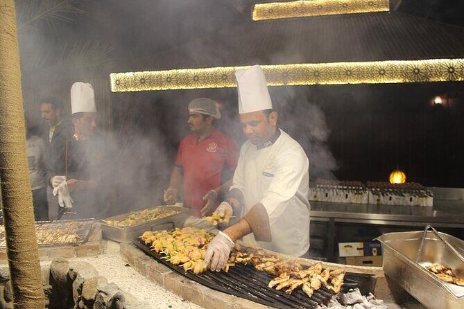 Evening Desert Safari with Quad Bike Experience, BBQ Dinner & Live Shows - Henna, Arabic Dress Photo Moments, and Shisha Corners