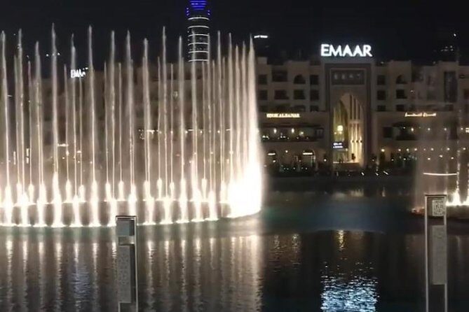 Evening Dubai City Tour with Burj Khalifa Experience - Madinat Jumeirah and the Palm: Arabian mini-city energy and big resort scale