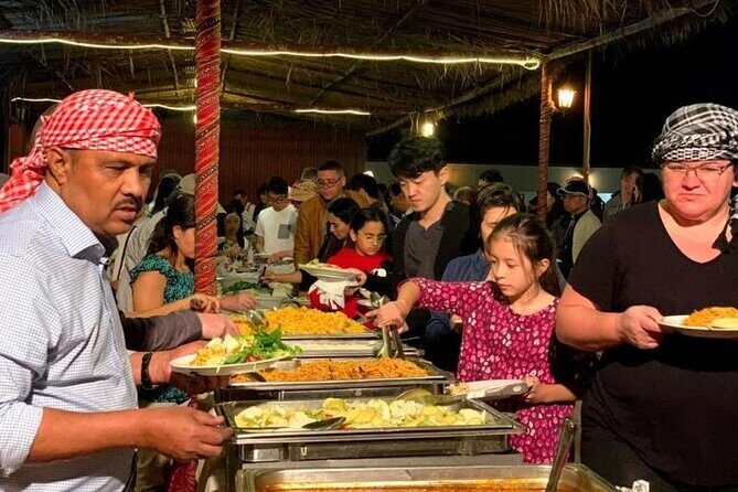 Evening Dubai Desert Safari Experience with Dinner and Shows - Camp Arrival: Coffee, Dates, Henna, Sheesha, and the Falcon Photo