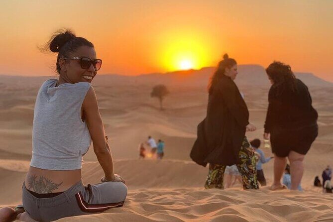 Evening Dubai Desert Safari Experience with Dinner and Shows - Dinner Setup: Buffet BBQ, Floor Pillows, and the Show Timing