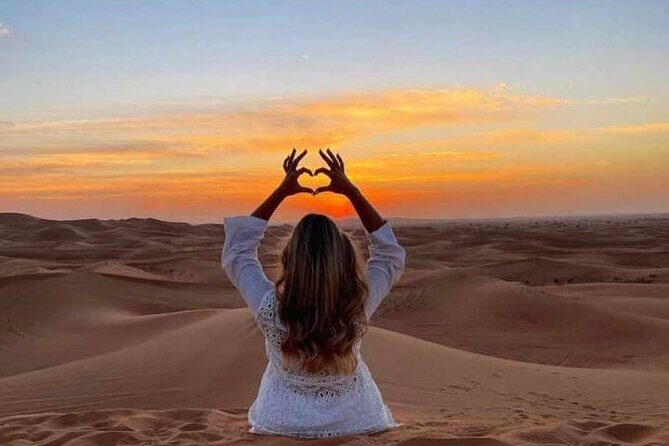 Evening Dubai Desert Safari, Red Sand, Premium camp shows & Diner - Live fire show, Tanura, and belly dance: the cultural entertainment portion