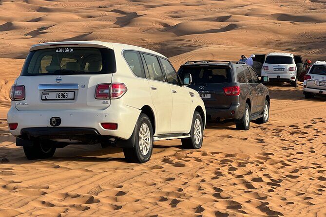 Evening Red Dune Desert Safari in Dubai with BBQ Dinner - Sandboarding: the included activity that surprises people