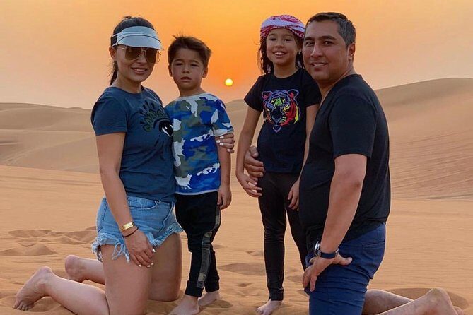 Evening Red Dunes Desert Safari With BBQ Dinner - Sandboarding, henna, and Arabic dress photos: the fun you can actually do