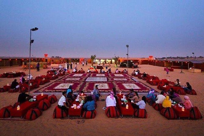 Evening Red Dunes Desert Safari With Quad Bike - Camel riding and sand boarding: camp activities that round it out