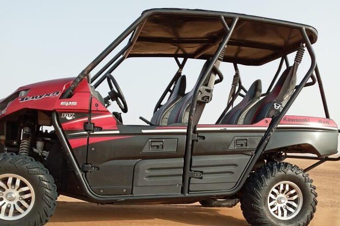 Evening Safari with Quad Bike, Camel Riding, BBQ Dinner and Dune Bashing - Live Entertainment: Belly Dancing, Tanura, and a Fire Show
