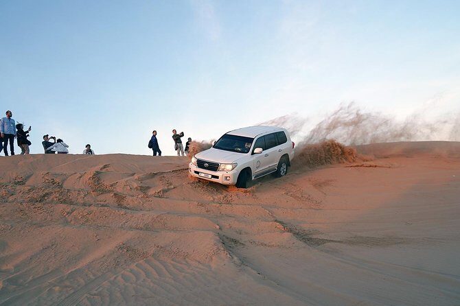 Exclusive Sunrise Desert Safari with Camel Ride Sand Boarding Dune Bashing - Light Refreshments and Juices: What That Means in Real Life