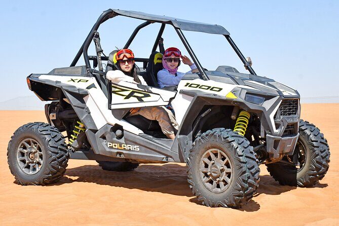 Experience Dubai Best Red Dune Evening Desert Safari BBQ Dinner - Al Awir desert camp: tea, henna, camel ride, and falconry