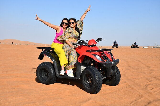 Experience Dubai Best Red Dune Evening Desert Safari BBQ Dinner - Lahbab dunes: dune bashing, optional ATV, and sand-boarding