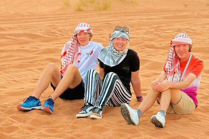 Experience Red Dune Safari Shows, Camels, BBQ & ATV Bike in Dubai - Sandboarding + camp arrival: the transition from motion to showtime