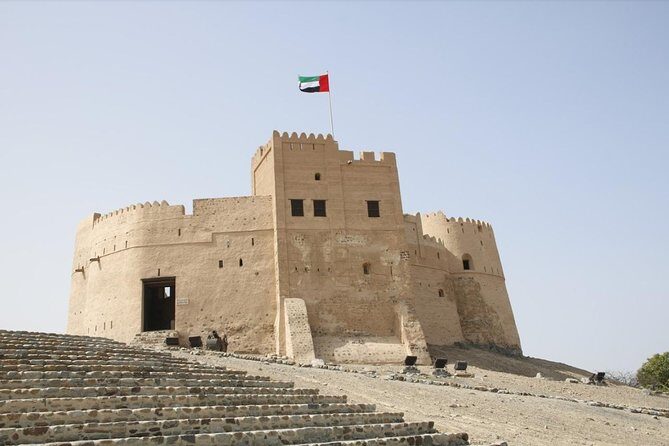 Five Emirates Full Day Tour from Dubai with Hotel Transfers - Sharjah morning: King Faisal Mosque, Al Ittihad Square Park, and the souq circuit