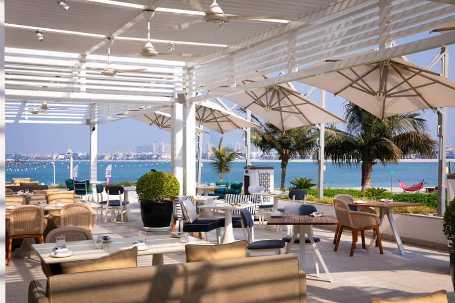 Fluid & Flavour: ENVY Lunch, Wine & Fluid Pool Club Pass - How the Day Works: ENVY Lunch, Then Fluid Pool Time