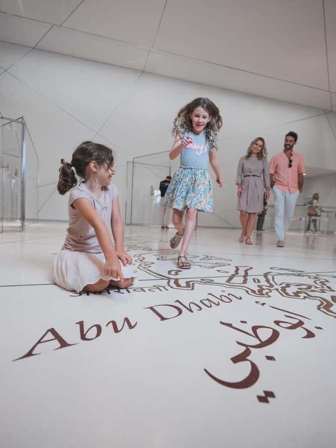 From Dubai: Abu Dhabi City Tour With Louvre Museum - Sheikh Zayed Grand Mosque: your checklist for dress code and timing