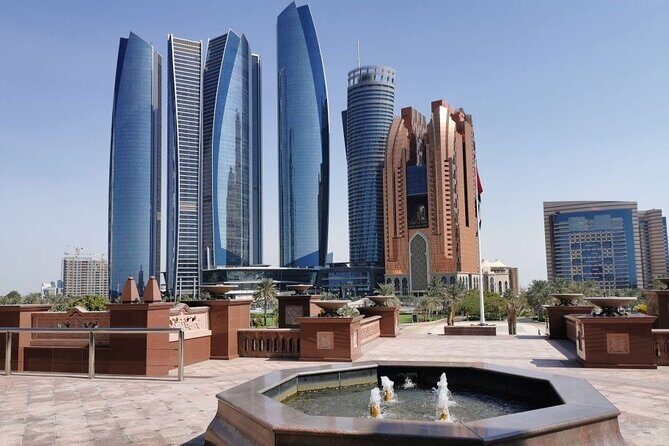 From Dubai: Abu Dhabi Day Tour with Warner Bros World Ticket - Driving views: Corniche, Al Bateen, and Saadiyat Island