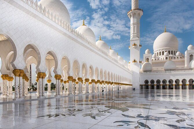 From Dubai: Full-Day Abu Dhabi Tour With Traditional Buffet Lunch - Dates Market, Carpet Market browsing, and what to buy (or skip)