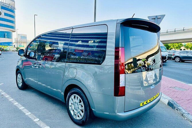 From Dubai: Private Chauffeur Service to Abu Dhabi - Photo stops with built-in momentum: Emirates Palace and Etihad Tower
