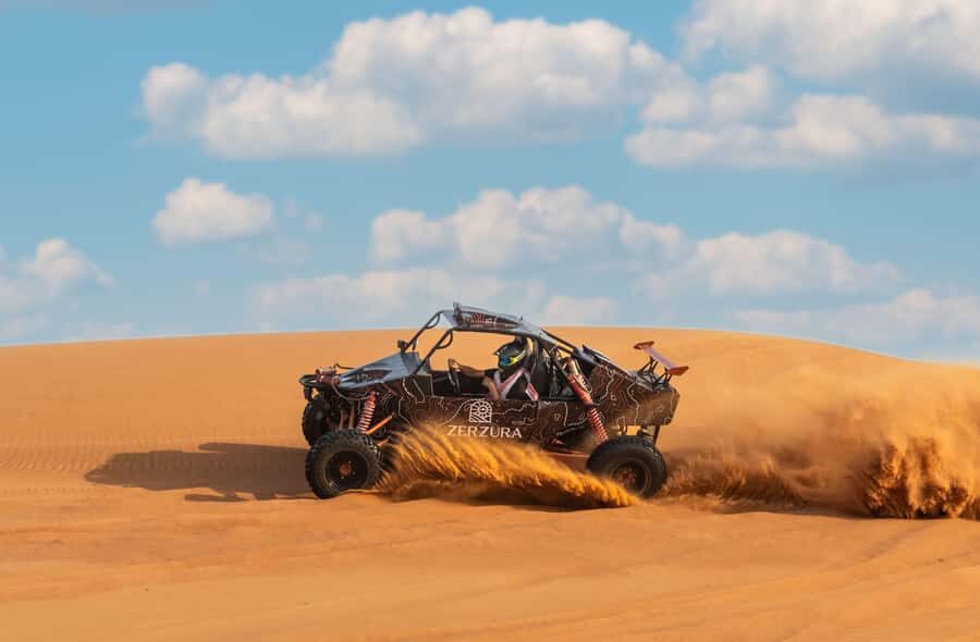 From Dubai: Zerzura Buggy Experience + Private Dinner - Zerzura: Welcome Drinks, Camel Ride, And Camp Time