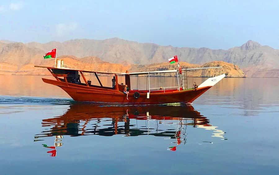 From Ras al Khaimah: Musandam Khasab Day Trip with Transfer - On Board a Handcrafted Dhow: Shade, Crew, and the Pace
