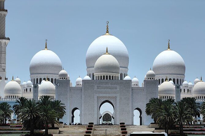 Full Day Abu Dhabi City Tour with Ferrari World - Emirates Palace Marina Photo Stop and Heritage Village Craft Time