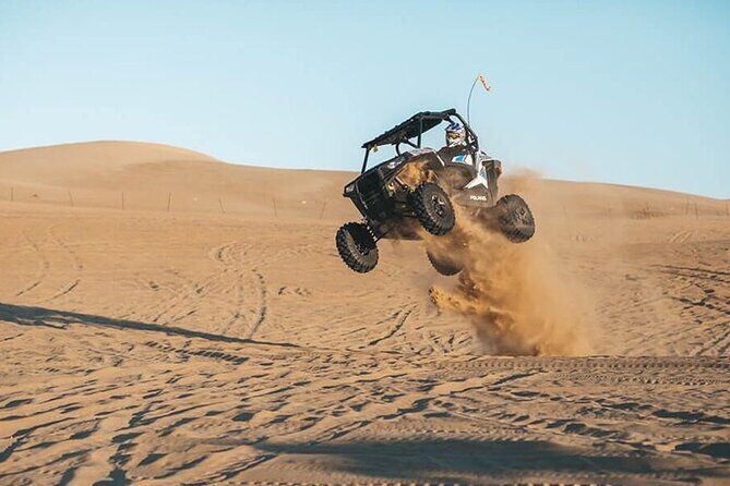Full-Day Desert Safari with Dune Buggy Ride in Dubai - Tanoura, belly dancing, and fire show after dinner