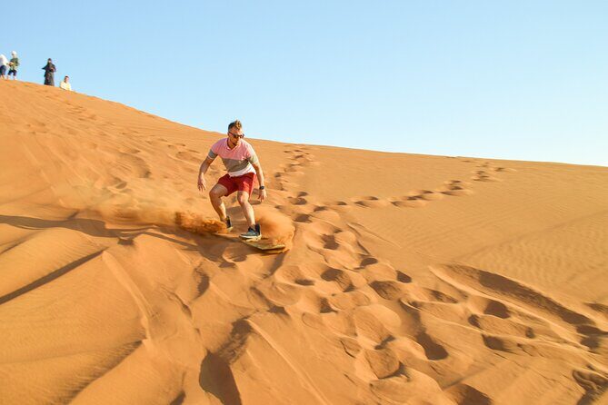Full-Day Guided Red Dunes Desert Tour in Dubai with Camel Ride - Henna, Falcon Photos, Traditional Dress, and Shisha