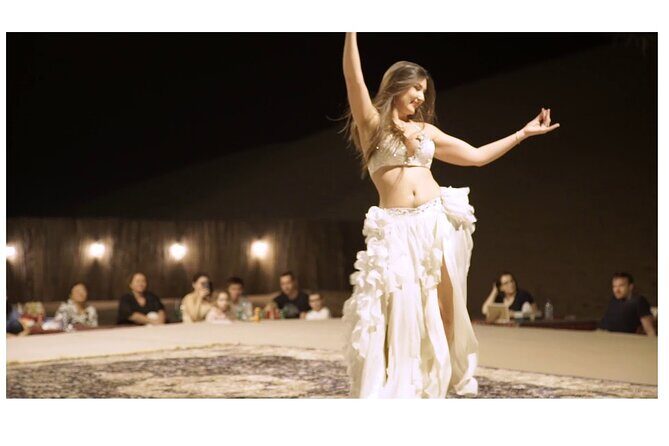 Full Day Safari Grand Adventures with Dune Bash on 4X4 in Dubai - Stop 2 at Afridi camp: henna, dining, and the fire-focused show cycle