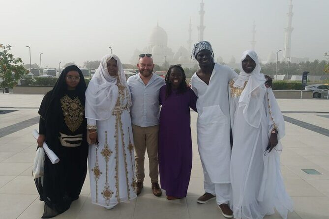 Full-Day Tour in Abu Dhabi with Pick up, Grand Mosque - Sheikh Zayed Grand Mosque Center: the dress code part you must plan