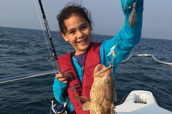 Go Fishing Dubai 5 hours Trolling & Regular Fishing - The 35ft Triton Setup: Semi-Shade, Toilet, and Fish-Finding Tech