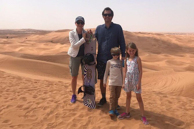Golden Dunes & Sunset Safari with BBQ, Camel Ride & Sandboarding - BBQ buffet dinner plus a full show schedule