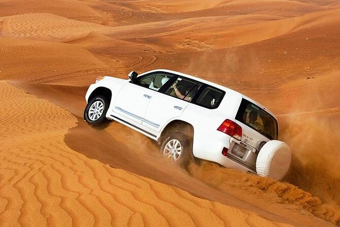Golden Dunes & Sunset Safari with BBQ, Camel Ride & Sandboarding - Bedouin camp time: tea, dates, shisha, and henna