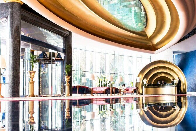 Guided Tour to Burj Al Arab with Optional Snack and Drinks - Entering Burj Al Arab: The Atrium Moment