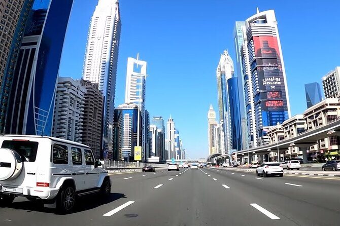 Half Day Dubai City Private Tour in Luxury SUV - Sheikh Zayed Road Pass-By: Car Showrooms and Downtown Landmarks