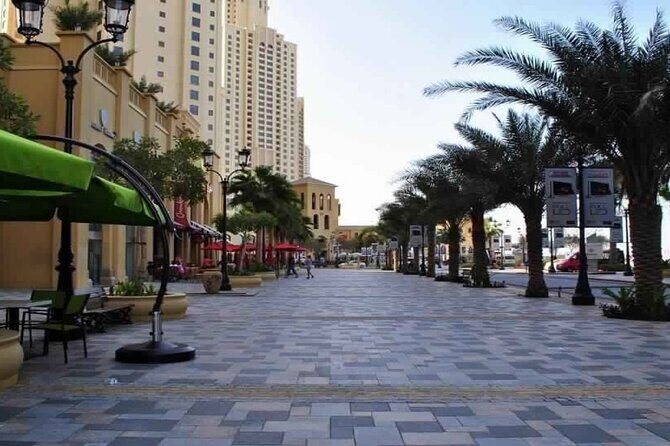 Half Day Dubai City Sightseeing Tour with Pick up - Jumeirah Public Beach and Burj Al Arab: iconic photos, quick stops