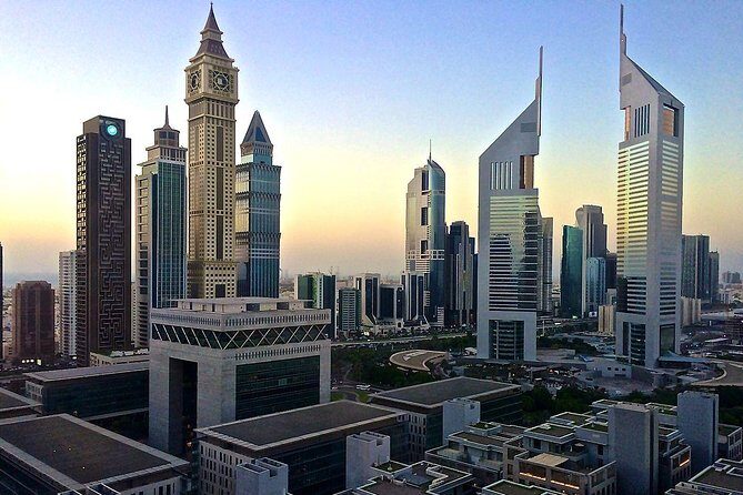 Half Day Dubai City Tour & visit to Dubai Aquarium Underwater Zoo - Souk Madinat Jumeirah, Palm Island views, and the modern skyline stack