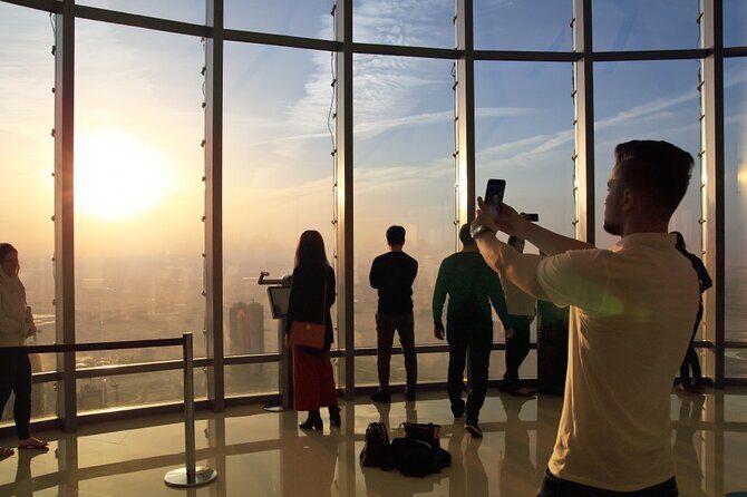 Half Day Dubai City Tour With Burj Khalifa At The Top Ticket - Jumeirah Mosque and Marjan Islamic Art Gallery: culture without getting stuck