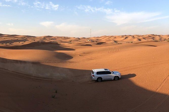 Half-Day Evening Desert Safari in Dubai with BBQ Dinner - Traditional Arabic camp: henna, shisha, and Arabic coffee