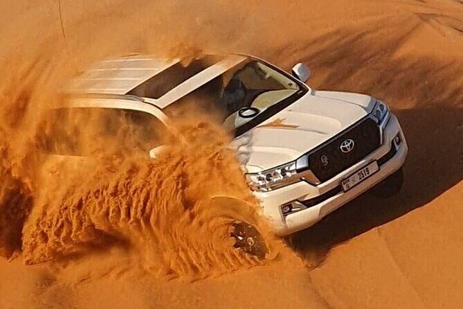 High Red Dunes Thrilling Desert Safari Sand Boarding BBQ Dinner - The Lahbab Dune Bashing Session: 30–45 Minutes of Off-Road Roller Coaster