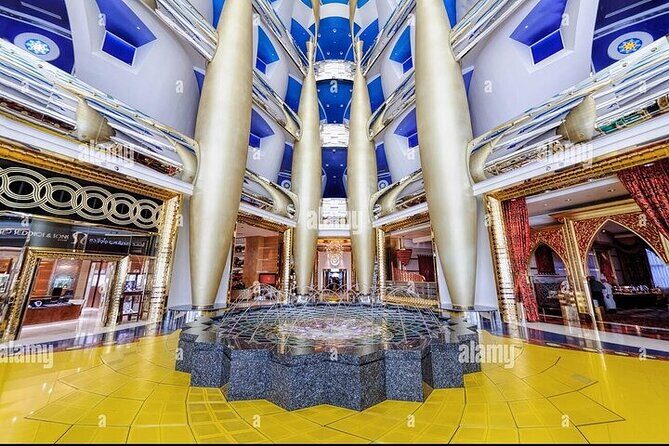 inside Burj Al Arab Guided Tour Dubai with optional transport - The Atrium Show: Dubai’s Tall Indoor Space and Its Fountain Moment