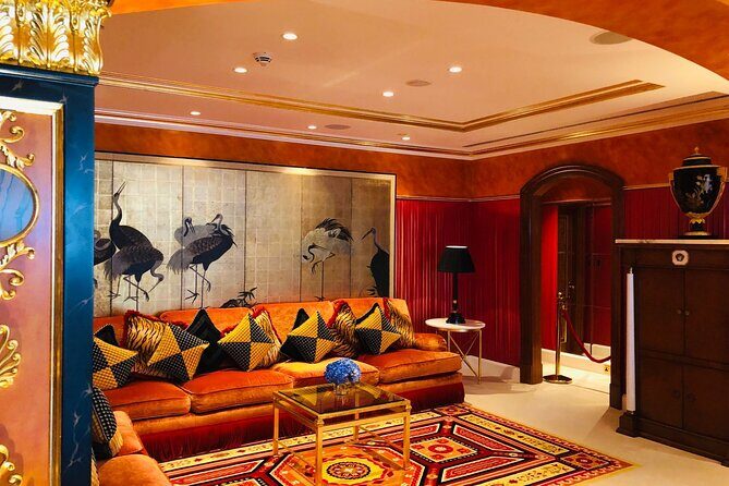 Inside Burj Al Arab Guided Tour with Transfer & Dinner Options - Royal Suite access: gold details, leopard carpet, and his-and-hers drama