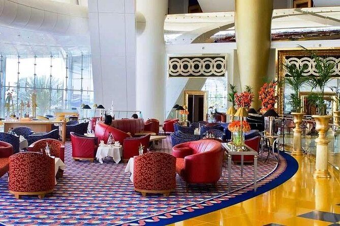 Inside Burj Al Arab Guided Tour with Transfer & Dinner Options - Pickup and transport: one-way private transfer plus buggy timing