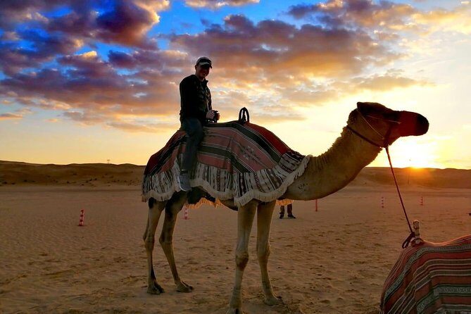 Morning Camel Trekking Over the Red Sand Dunes - Getting from your hotel to the dunes: pickup and 4WD reality
