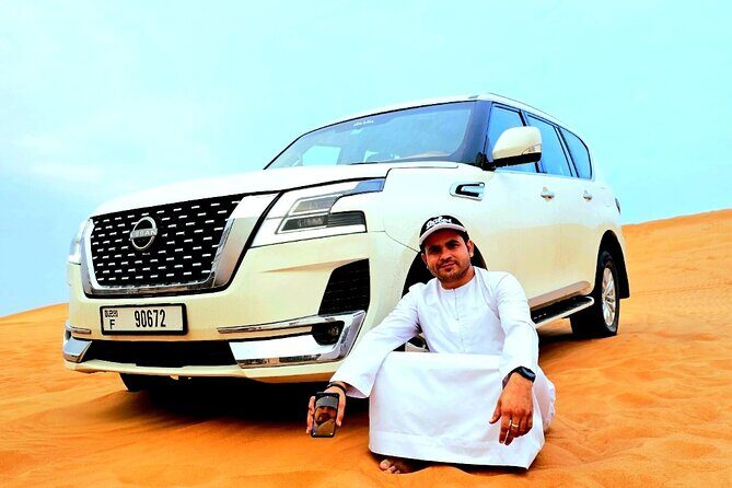 Morning Desert Safari in Dubai with Quad Bike and Camel Ride - Quad biking (ATV) in a large fenced desert area