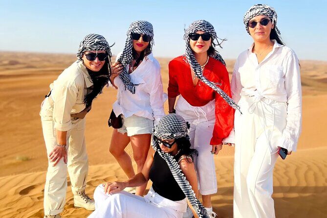 Morning Desert Safari in Dubai with Quad Bike and Camel Ride - Sandboarding: sliding down the dunes like you mean it