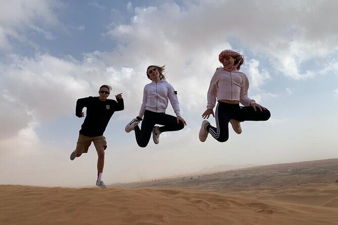 Morning Desert Safari, Quad Bike, Sandboard and Camel Ride - Camel Farm Stop: Feeding, Interaction, and a Real Break