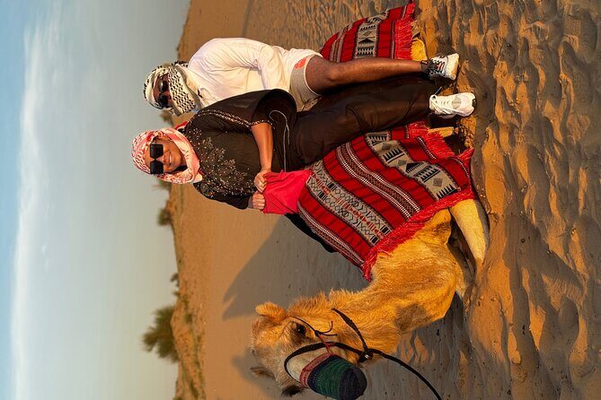 Morning Desert Safari Tour With Dune Bashing & Camel Ride - Sunrise views and dune-top photography that actually feels planned