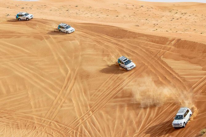 Morning Desert Safari With Dune Bashing - Camel Farm Stop: Snacks, Drinks, and a Slight Pace Change