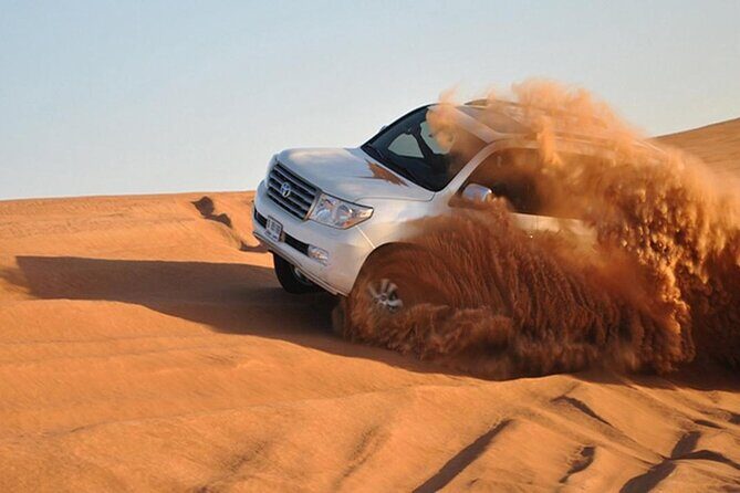 Morning Desert Safari with Sandboarding & Camel Ride on Red Dunes - Sandboarding and Quad Biking on the Red Dunes