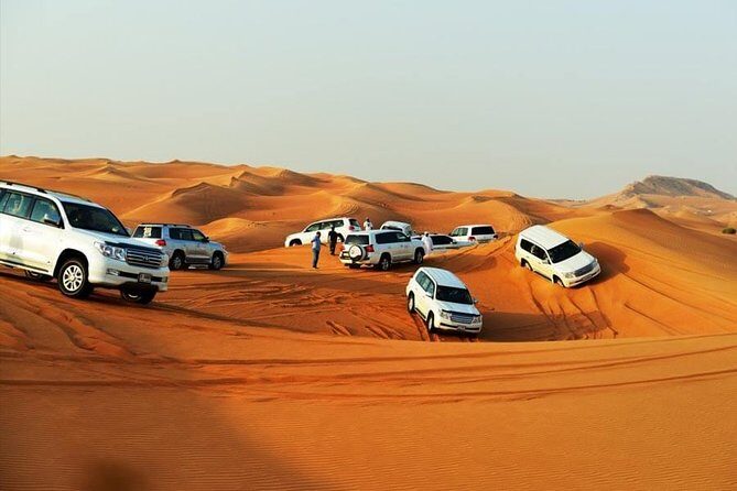Morning Desert Thrill: Quad Bike Safari Escape - Sandboarding and the camel ride: play plus tradition