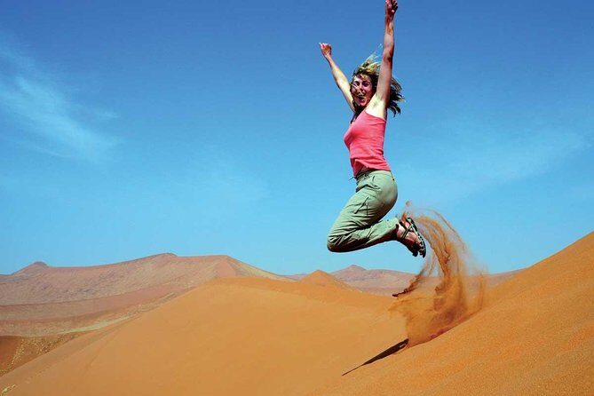 Morning Dubai Desert Safari with Dune Bashing, Camel Riding Dubai - Sandboarding: Sliding Down the Dunes (Included and Repeats Welcome)